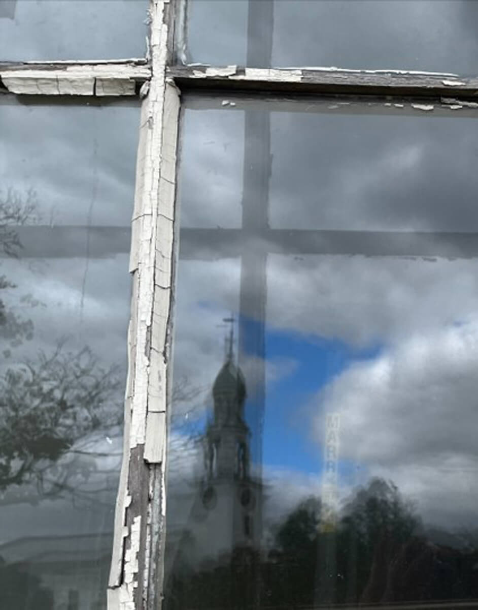 Codman Square Health Center - Window and sash restoration on the cupola and dormer