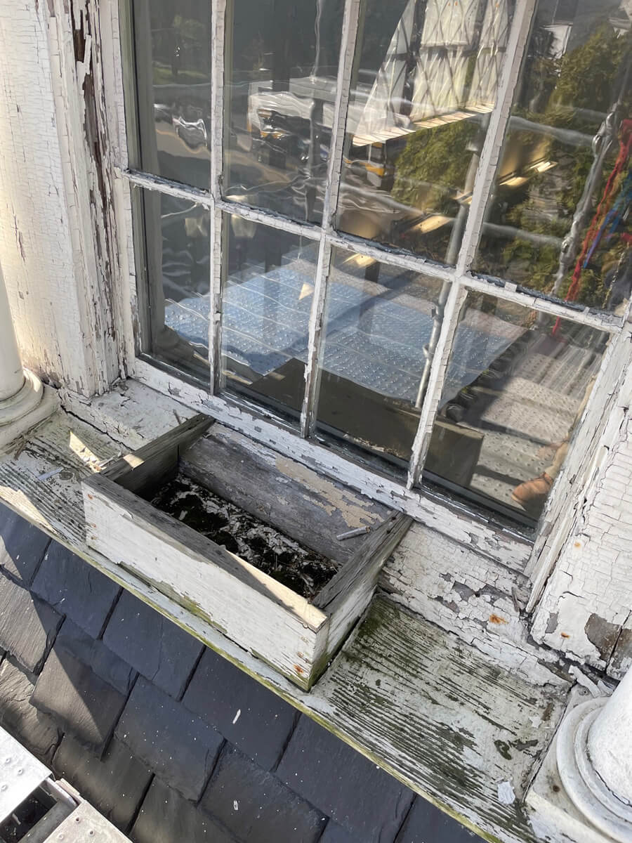 Codman Square Health Center - Window and sash restoration on the cupola and dormer